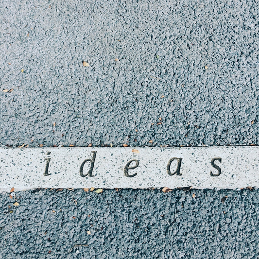 ideas carved on concrete surface