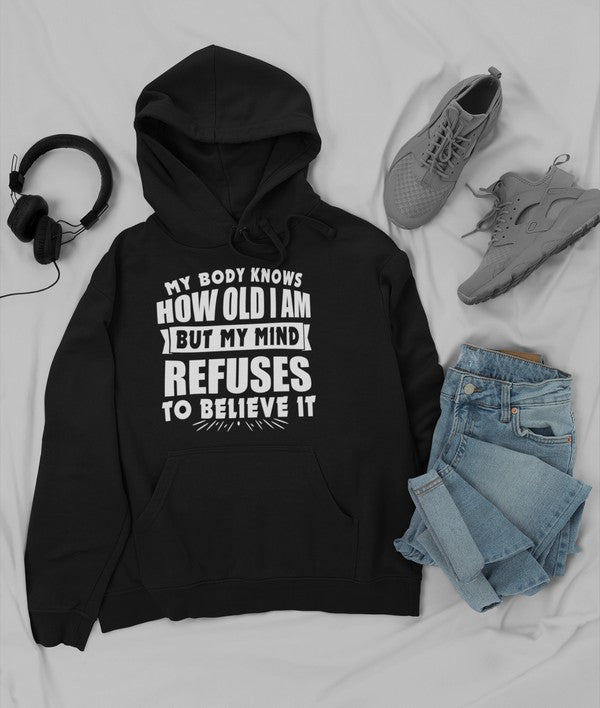 My Body Knows How Old I Am But My Mind Refuses to Believe It Hoodie-1
